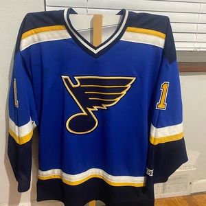 #1 St. Louis blues Roman Turek jersey, large, no tears or rips, non smoking